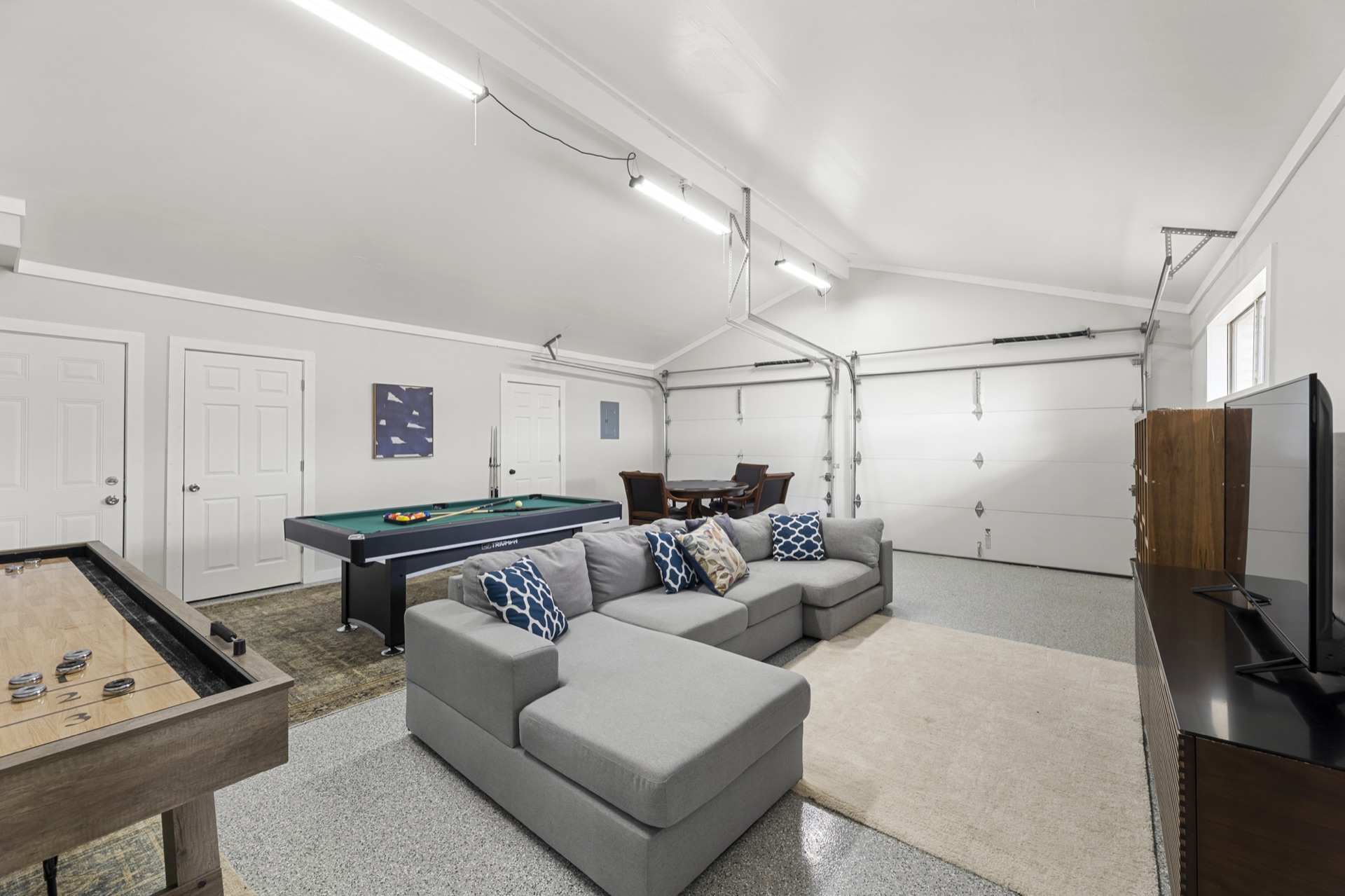 Game room with pool table and entertainment area